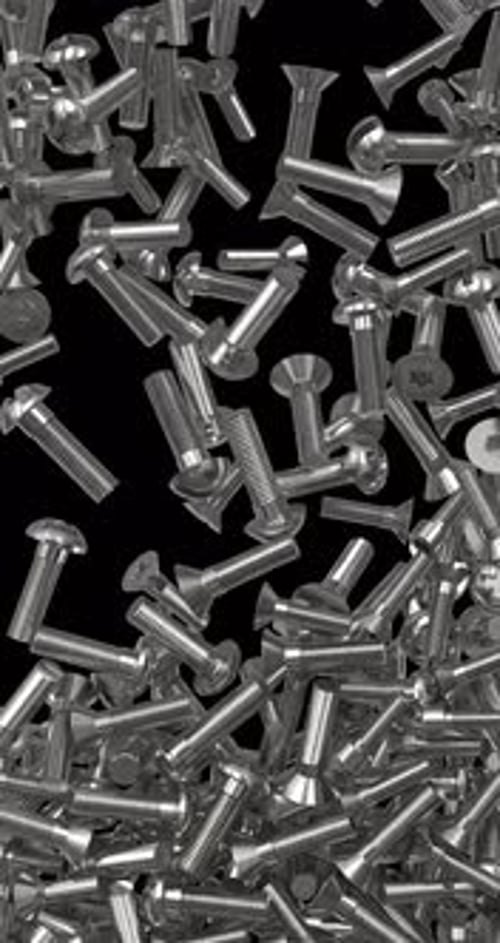Metallic Screws and Bolts Falling and Accumulating