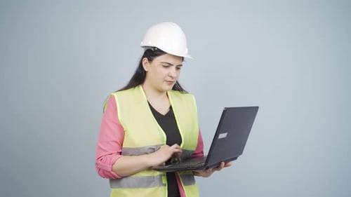 Engineer waving at camera.