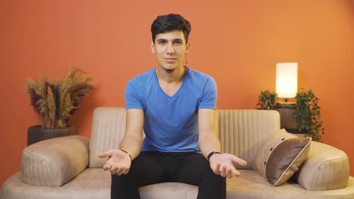 Man looking at camera in amazement.