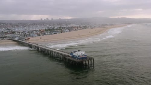 Aerial Drone Parallax Shot of Newport Beach Pier, Ocean and City - 4K UHD