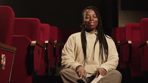 Portrait of Black Female Standup Comedian in Theater