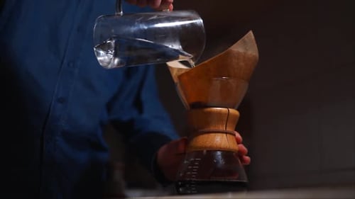 Water Pouring Into Coffee Filter System