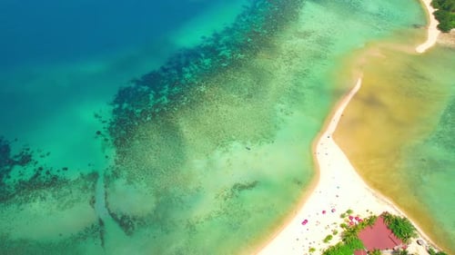 Tropical island and sandbar with stunning white sandy beaches