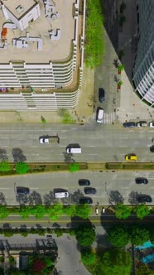 Numerous cars driving along the busy roads. Crazy traffic of metropolis at daytime.