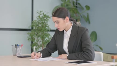 Young Businesswoman Working on Documents, Doing Paperwork