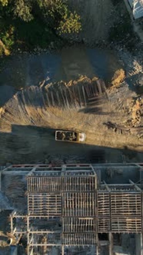 Vertical Video Machine Transports Soil to the Construction Site
