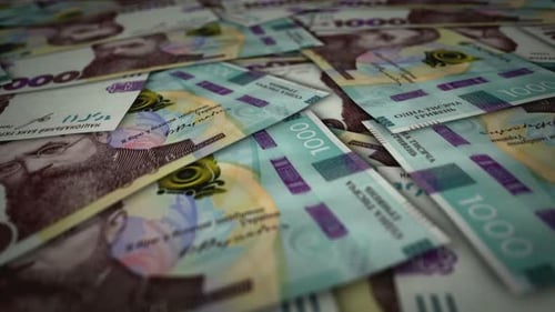 Ukraine Hryvnia 1000 banknote flying over money surface