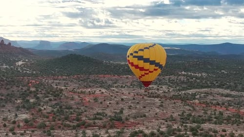 Hot Air Balloon At Sunrise In Sedona, Arizona, USA - drone shot