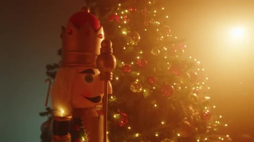 Nutcracker Near the Tree in Christmas Time