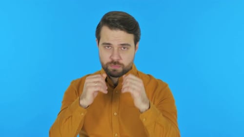 Man with Fists Up Boxing in Close-up Portrait
