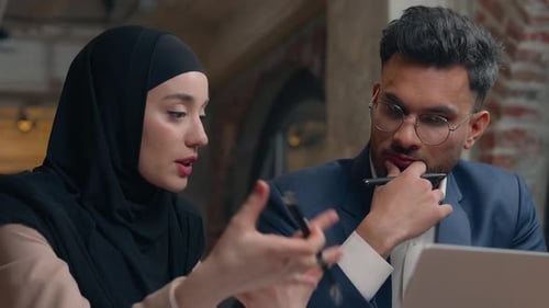 Business Team Collaboration with Laptop in Modern Office