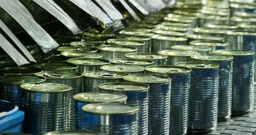 Cans Advance on Factory Production Line