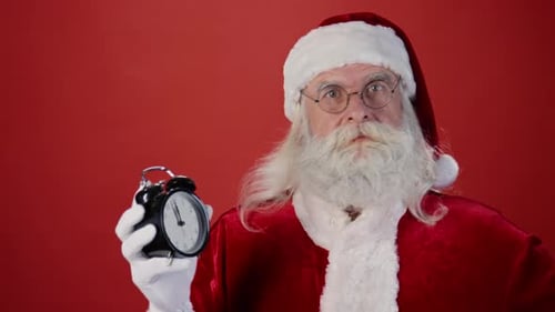 Santa Claus Holding an Alarm Clock