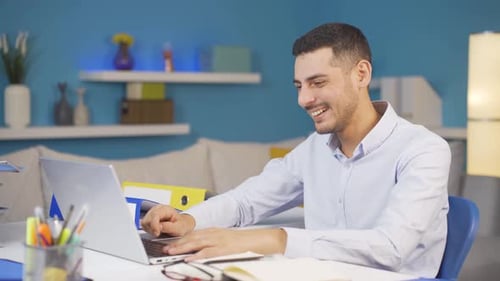 Home office worker man looking with satisfied expression.