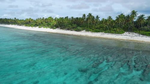 Tropical Coastline with Sand Beach and Transparent Ocean Aerial View of Fuvahmulah Island