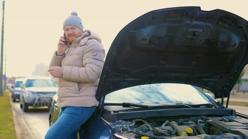 Man Calls for Help with Broken Down Car