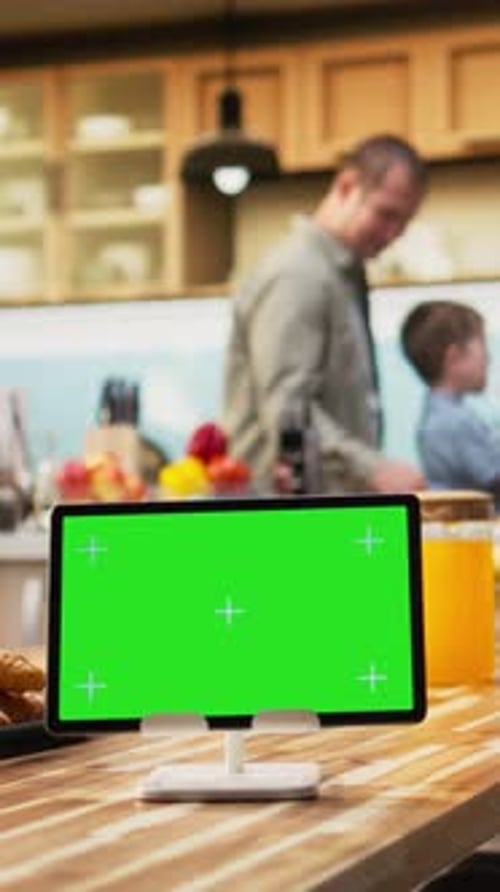 Vertical Video Mockup Screen on Tablet with Young Family Having Fun During Weekend Activity