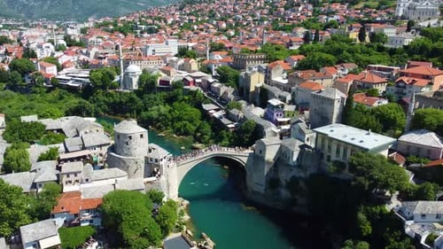Drone footage revealing the natural beauty of the Neretva River cutting through Mostar’s historic ce