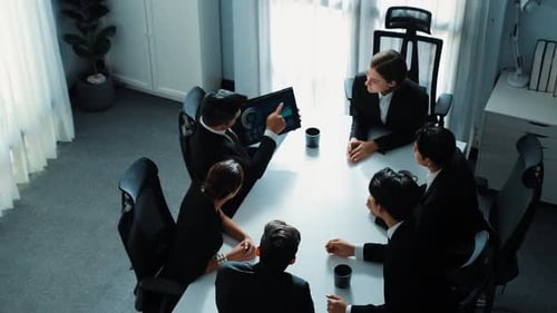 Top view of project manager present financial graph on tablet. Directorate.