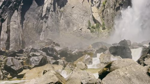A Beautiful Waterfall From a Close Distance Falling Among Stone Rocks