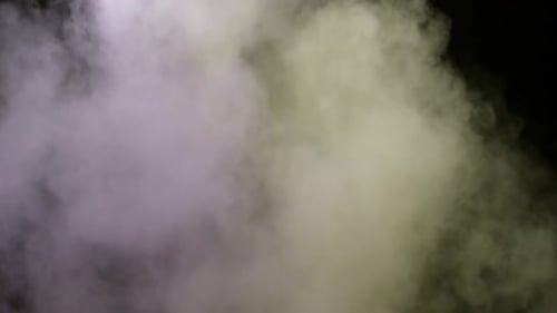Dynamic Colored Smoke Effect Swirling on Black Background
