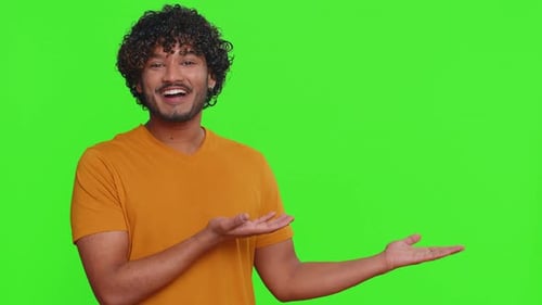 Indian Man Showing Thumbs Up Pointing Empty Place Advertising Area for Commercial Text Copy Space