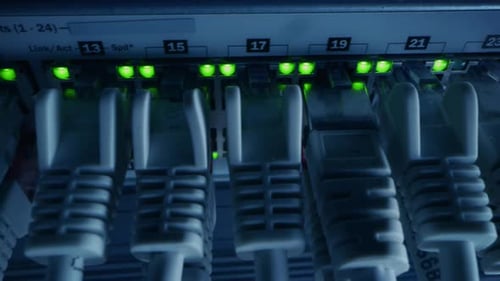 Macro Shot: Ethernet Data Cables Connected to Router Ports with Flashing Lights. Telecommunications