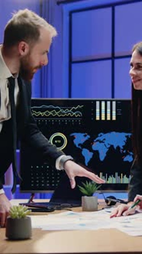 Business Team Meeting and Shaking Hands in Office