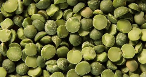 Rotation green peas texture background, Dry peas grains pattern,