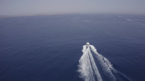 Aerial Of Boat Speeding In The Sea