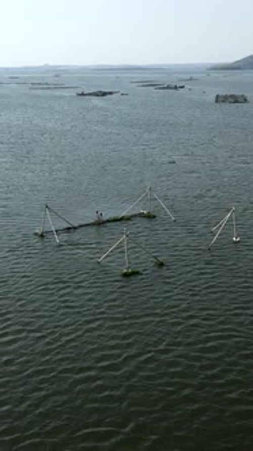 Drone Flying Over Tri an Lake Vietnam Where you Can See the Fish Farms Made By Hand with Recycled