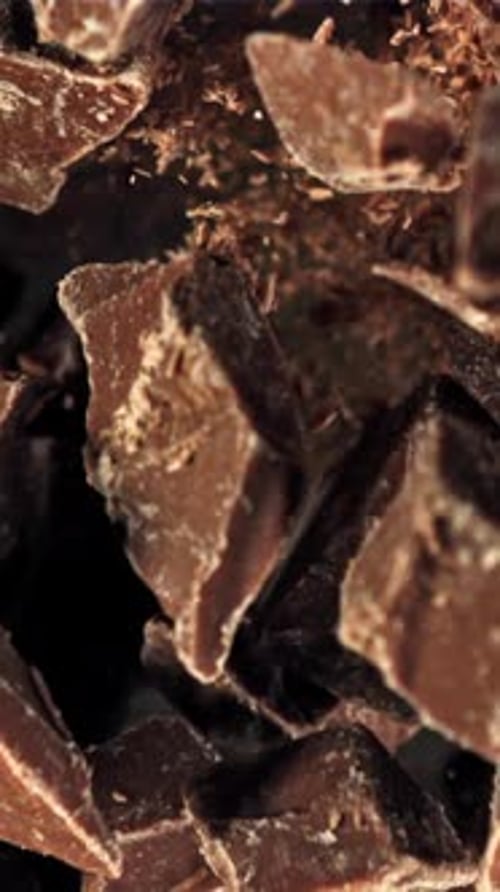 Chunks of Chocolate Fly Up and Fall Down Filmed on a Highspeed Camera at 1000 Fps