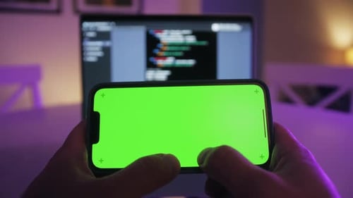 Phone with Chroma Key Green Screen with Man Working with Chatbot AI Online Connecting with AI and