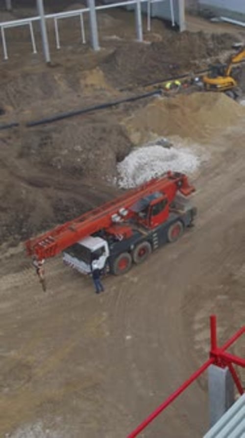 Heavy Machinery Operates on Construction Ground Large Earthwork Site with Crane Preparing for