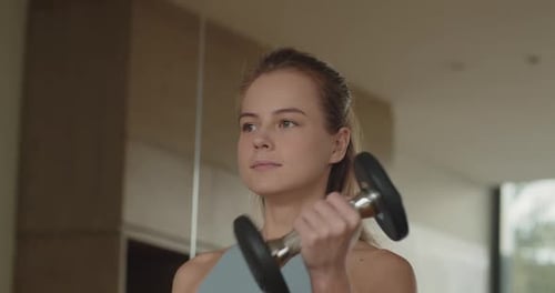 Female Hands Taking Bodybuilding Dumbbells in Gym Club Close Up Woman Hands Taking Weight Lifting in