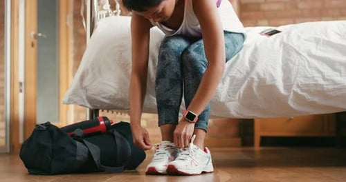Woman Getting Ready to Workout at Home