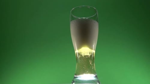 Refreshing Beer with Bubbles on Green Screen