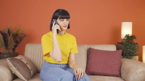 Woman receiving gospel on the phone.