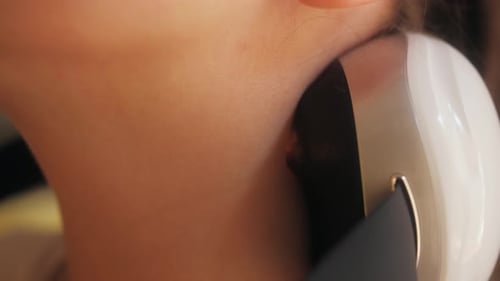 Person Use an Electric Massager at Home Close Up Shot