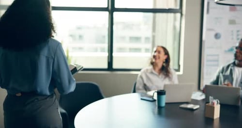 Business meeting in office with diverse colleagues