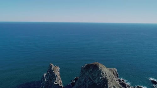 Aerial Panoramic View of Huge Rocks at Seaside and Waves Crashing to the Coast Beautiful Seascape