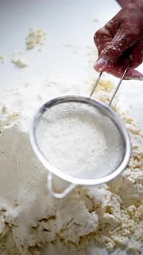 Hand Sifting Flour with Sieve for Baking