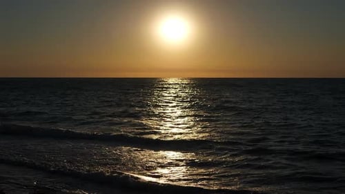 Beautiful View of the Sea and the Sun at Sunset