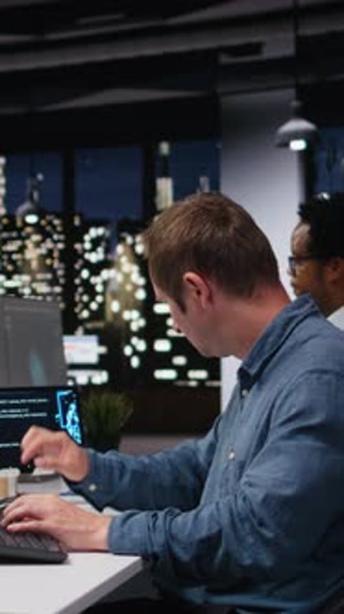 Vertical Video Software Developer in Office Analyzing Machine Learning Algorithms
