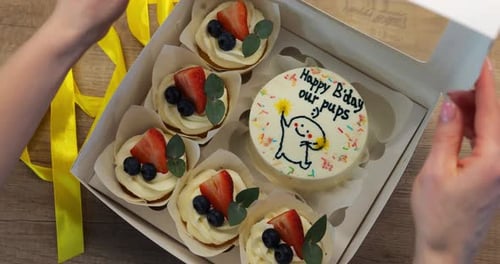 Fresh Cupcakes and Cake in a Box