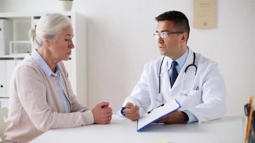 Doctor consults senior woman about medical test results