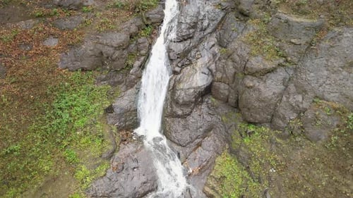 Aerial View of Rocky Waterfall in Nature