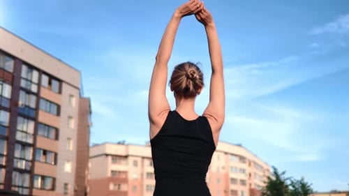 Yoga and Fitness Exercise Outdoors in City Beautiful Young Woman Training Alone in Early Morning