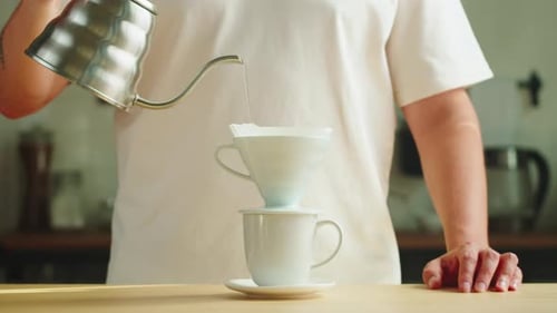 Person Making Pour Over Coffee at Home