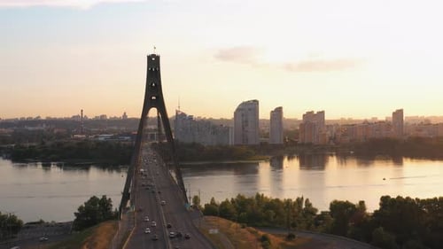 Aerial View of River Bridge with Moderate Car Traffic